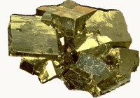 Hunk of gold colored metal with lots of angular faces.