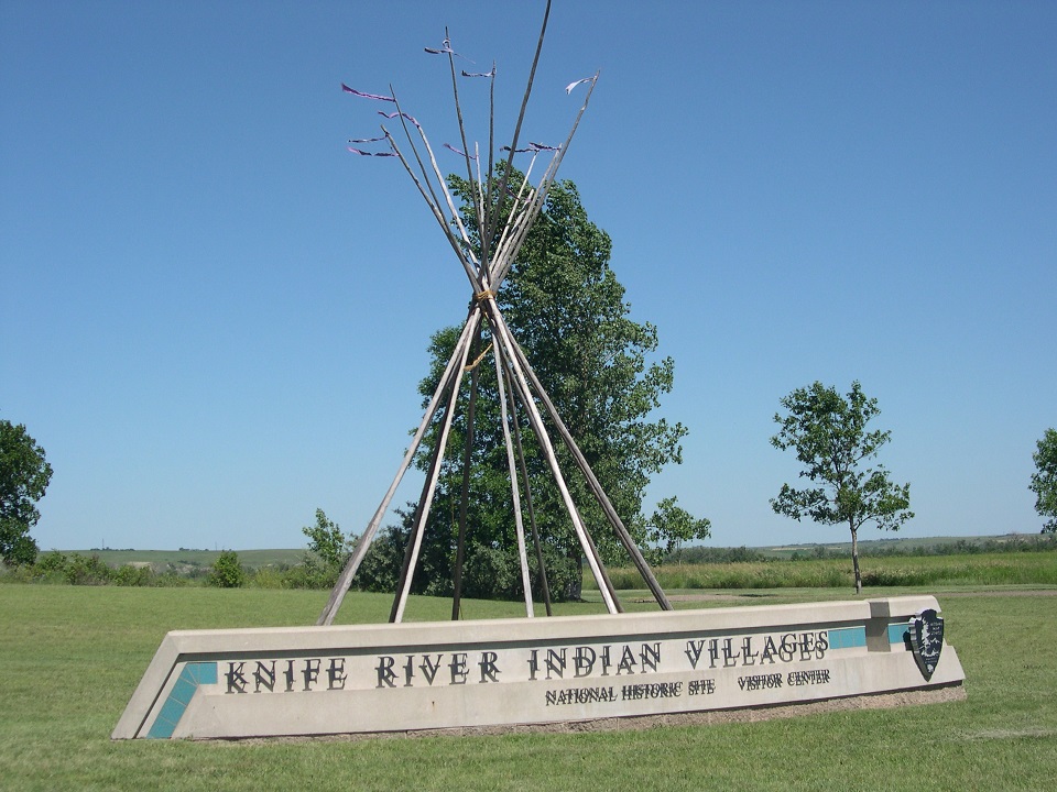 KNRI Sign Horizontal, concrete, outdoor sign states Knife River Indian Villages National Historic Site