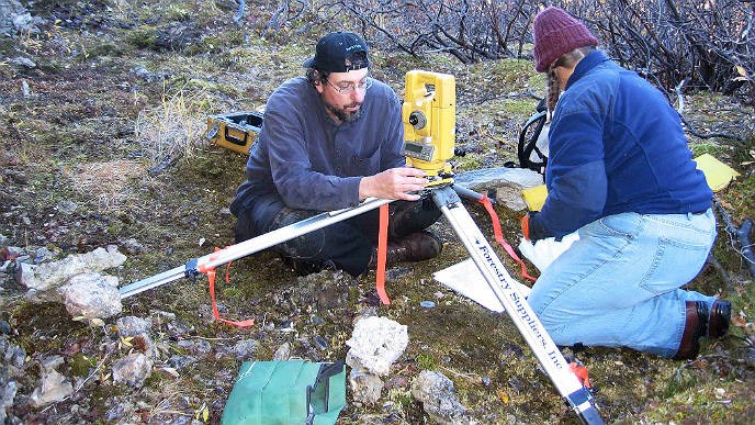 2 scientists and gps equipment