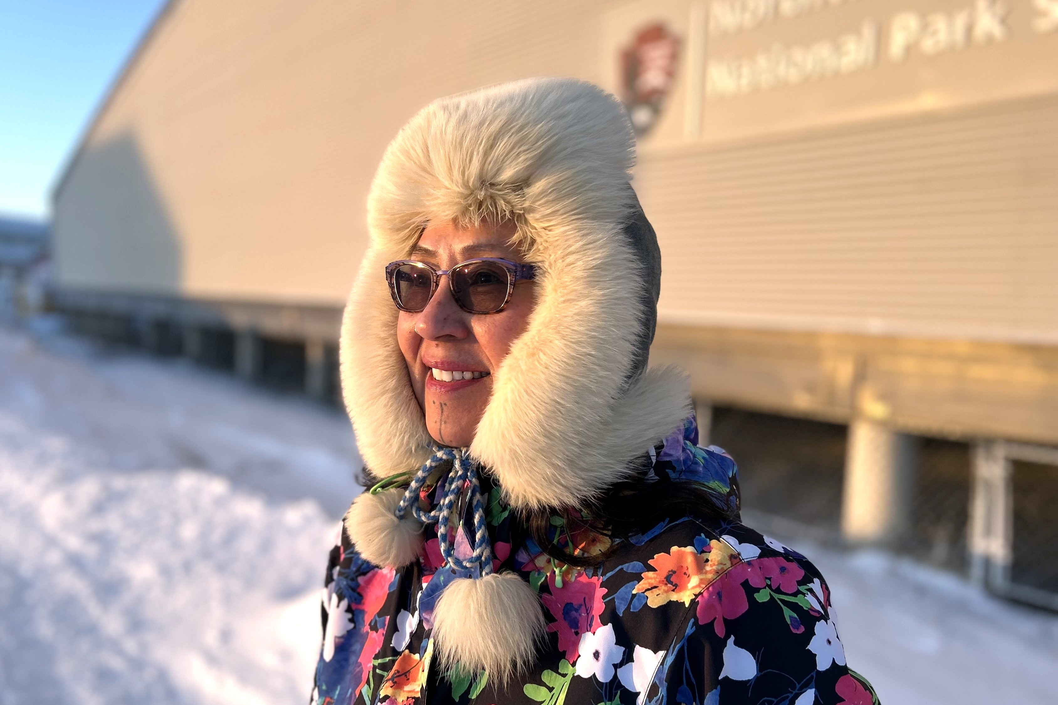 Siikauraq Whiting in front of the Northwest Arctic Heritage Center