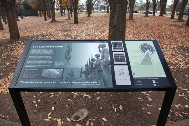 A wayside entitled, "cost of freedom" offer audio, braille, and tactile elements.