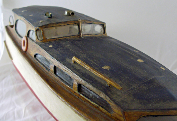 wooden model boat viewed from above