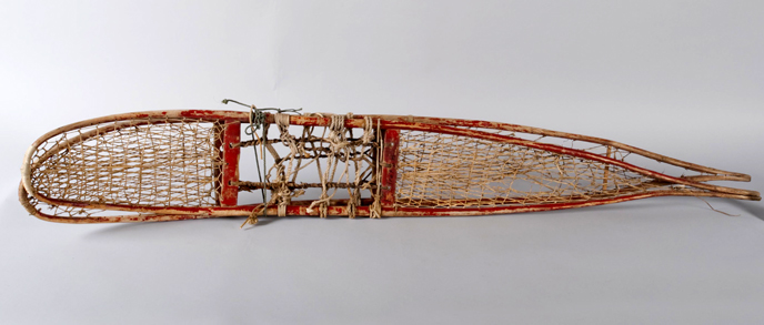 handcrafted snowshoes made with Birch and painted red.