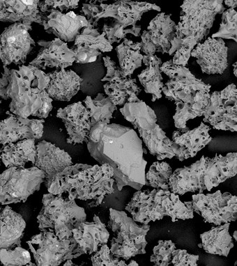 Photo of ash from Redoubt's 1989 eruption as seen under a microscope.