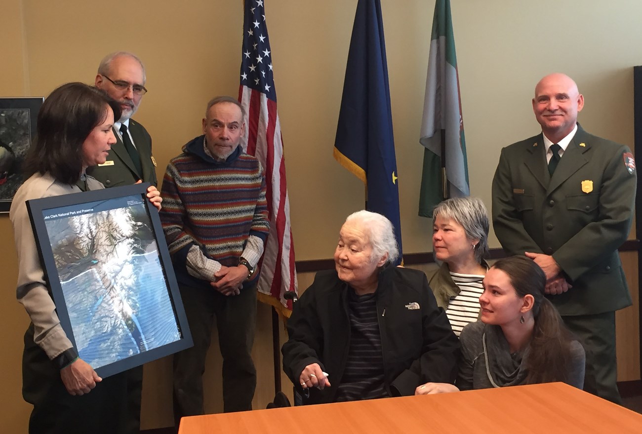Park Superintendent Susanne Fleek-Green presents Mrs. Hammond with the first map bearing the name Jay S. Hammond Wilderness Area.
