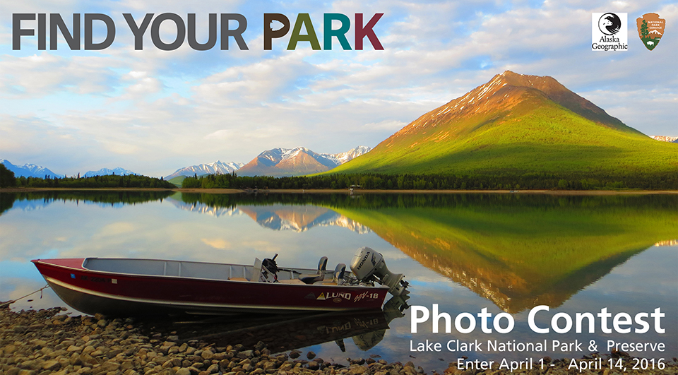 Photo of mountains and puffy white clouds reflecting in a calm bay with a small skiff in the foreground. Photo of mountains and puffy white clouds reflecting in a calm bay with a small skiff in the foreground.