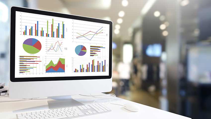 A computer showing real-time data graphs