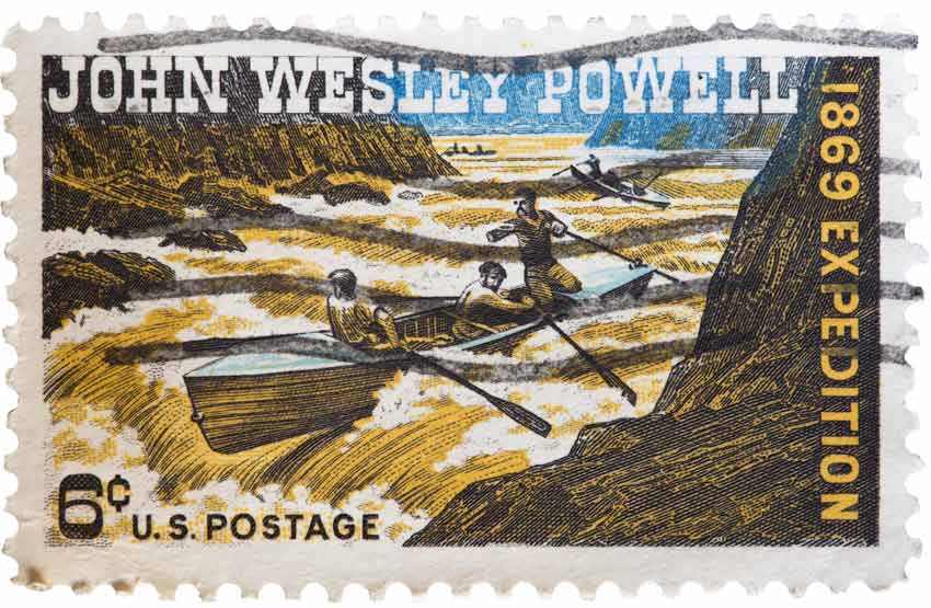 John Wesley Powell A postage stamp showing John Wesley Powell facing the rapids of a river.