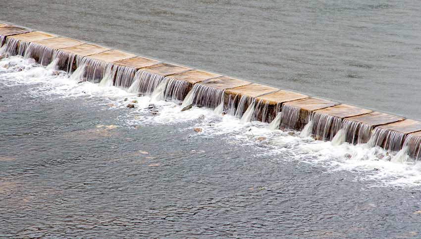 A weir slows water and creates small ponds