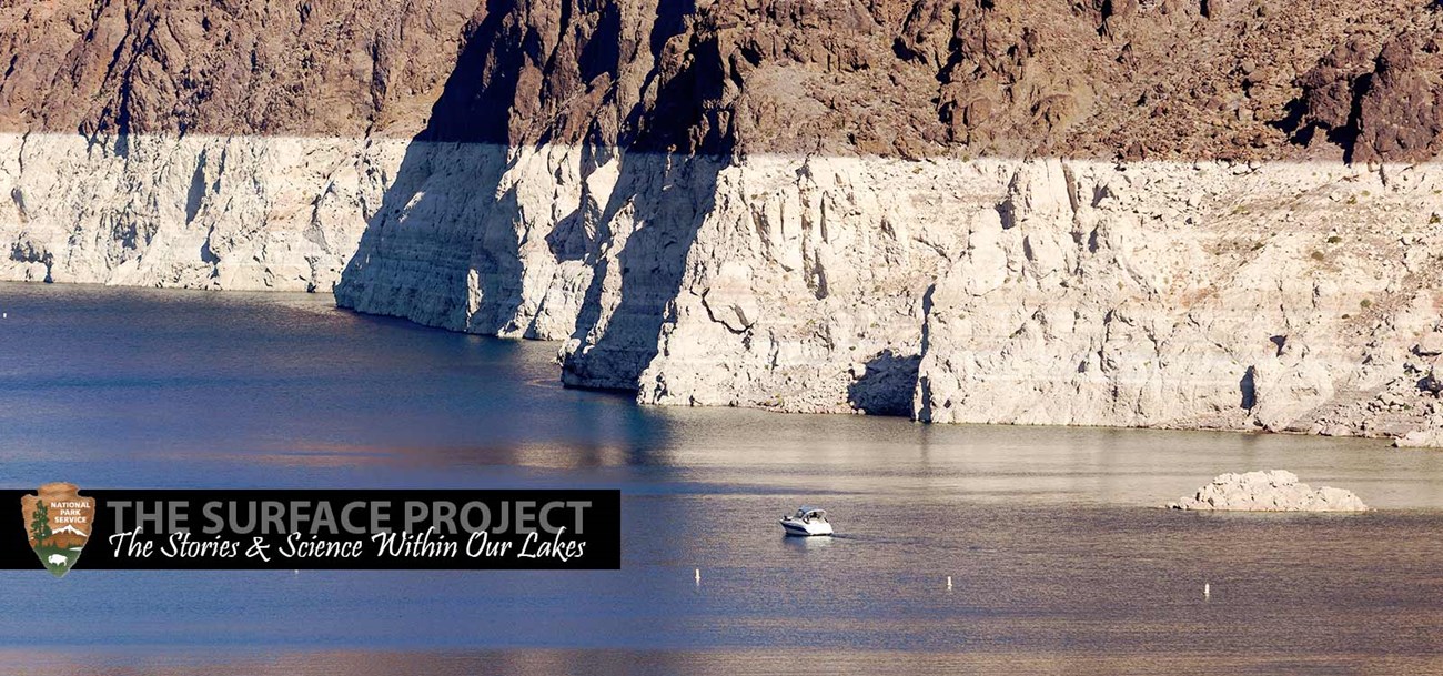 A white ring wraps around the lake that signifies the drought.