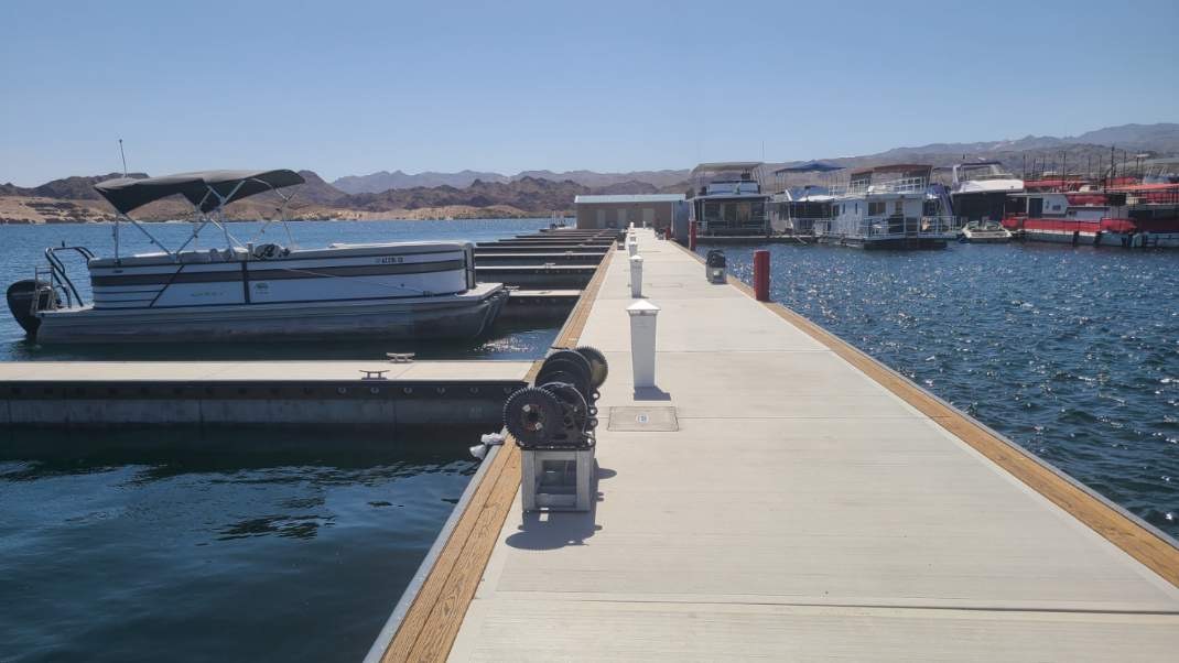 Katherine-Landing-New-Fuel-Dock A dock with boats and a building