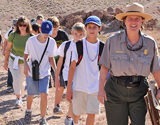 2016 hike 320x250 Photo of Park Ranger leading group of youth and adults on a trail in the Muddy Mountains Wilderness
