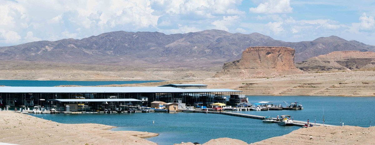 Lake Mead with a marina and Temple Bar formation and mountains in the background