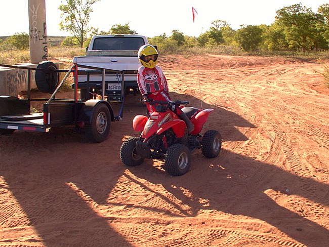 A rider gets ready to hit the trail. A rider gets ready to hit the trail.
