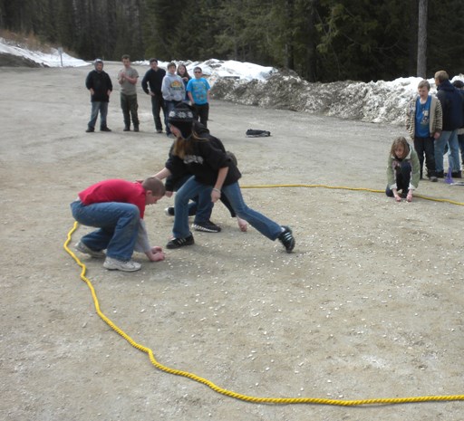 Students play the Land of Many Opportunists species survival program