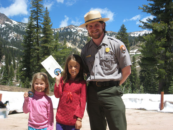 Junior Rangers outside of the Kohm Yah-mah-nee Visitor Center