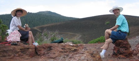 Hikers enjoy lunch on top of Cinder Cone