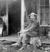 Edward Drake at his cabin in 1887