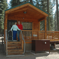 Visitors at a Manzanita Lake accessible camping cabin