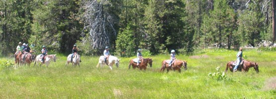 Horseback riders in Warner Valley Horseback riders in Warner Valley