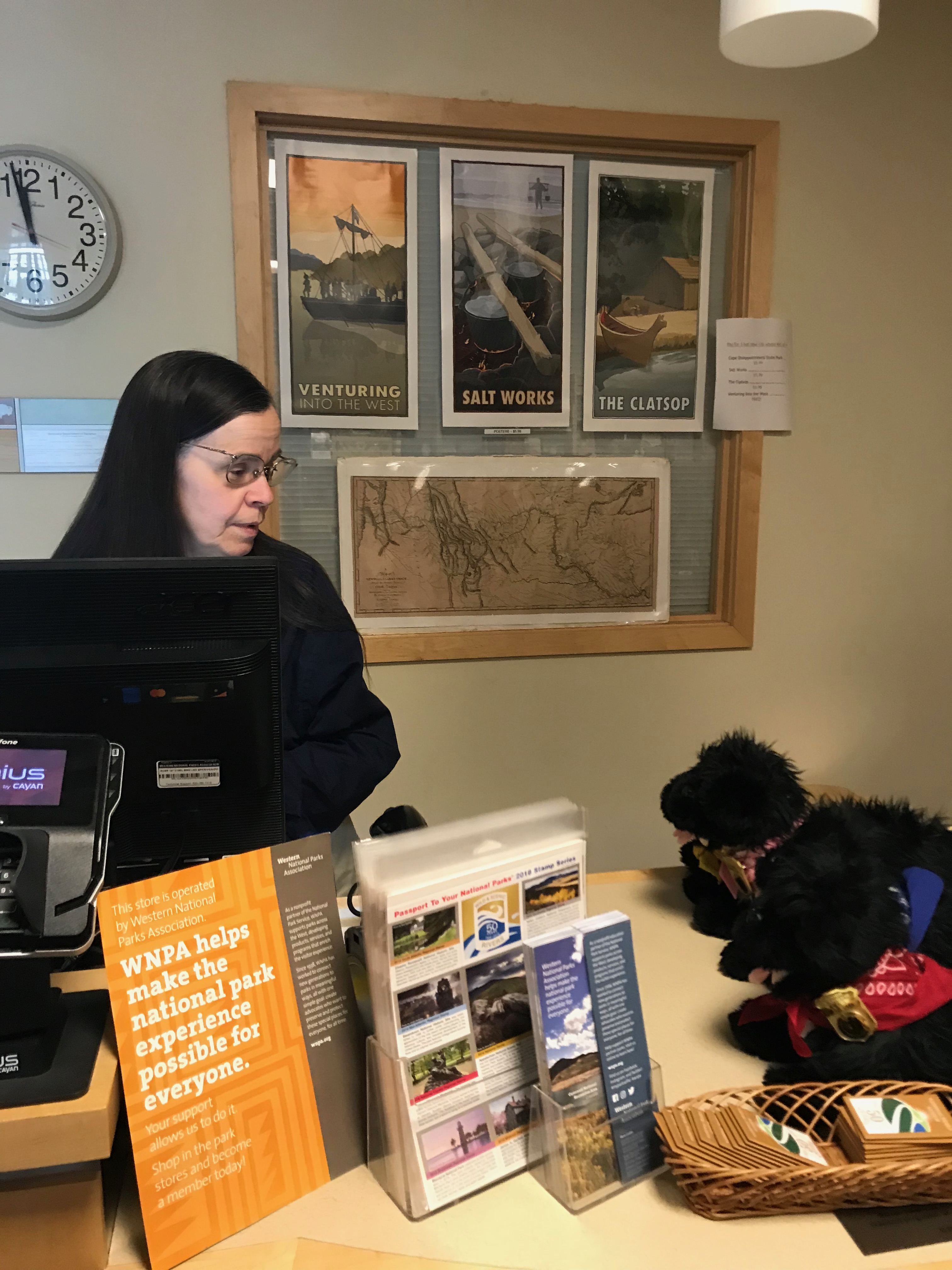 Woman standing at cash register