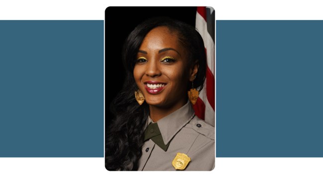 Photo of young woman in Park Service Uniform. She has long dark hair.