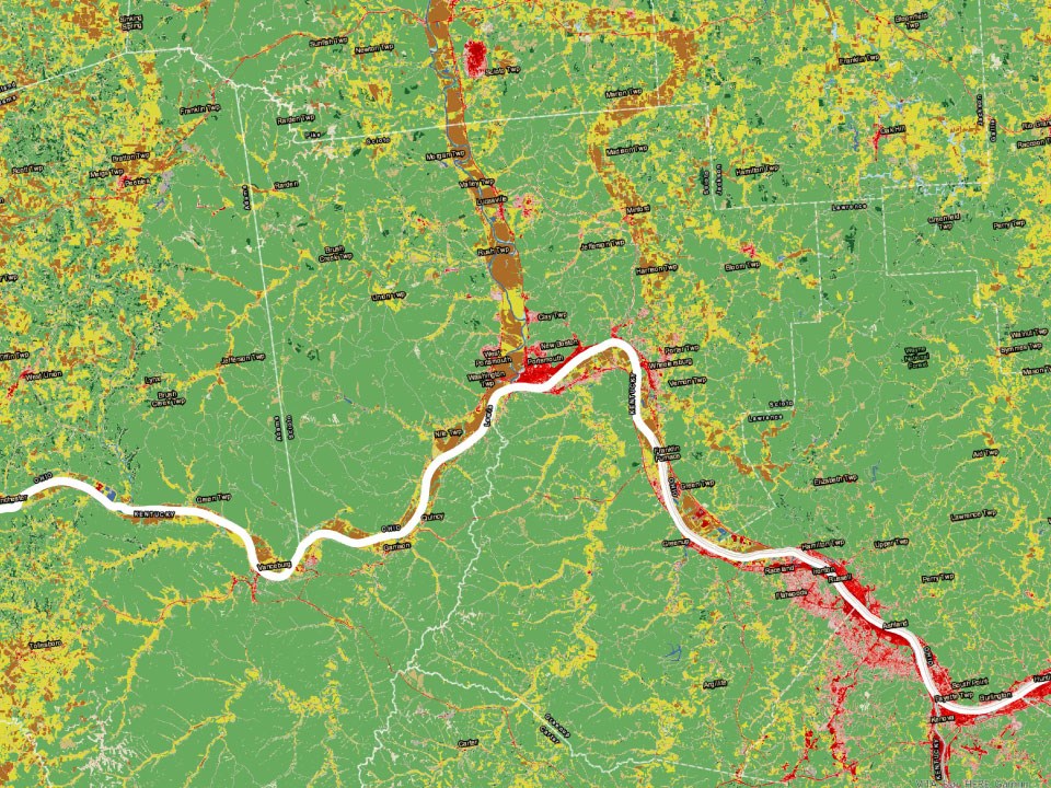 Scientific map of a section of winding trail. Bright green yellow and red patches mark undefined variables.