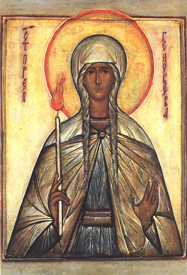 Saint Genevieve_ Orthodox Church of America gold painting of female saint with torch in right hand