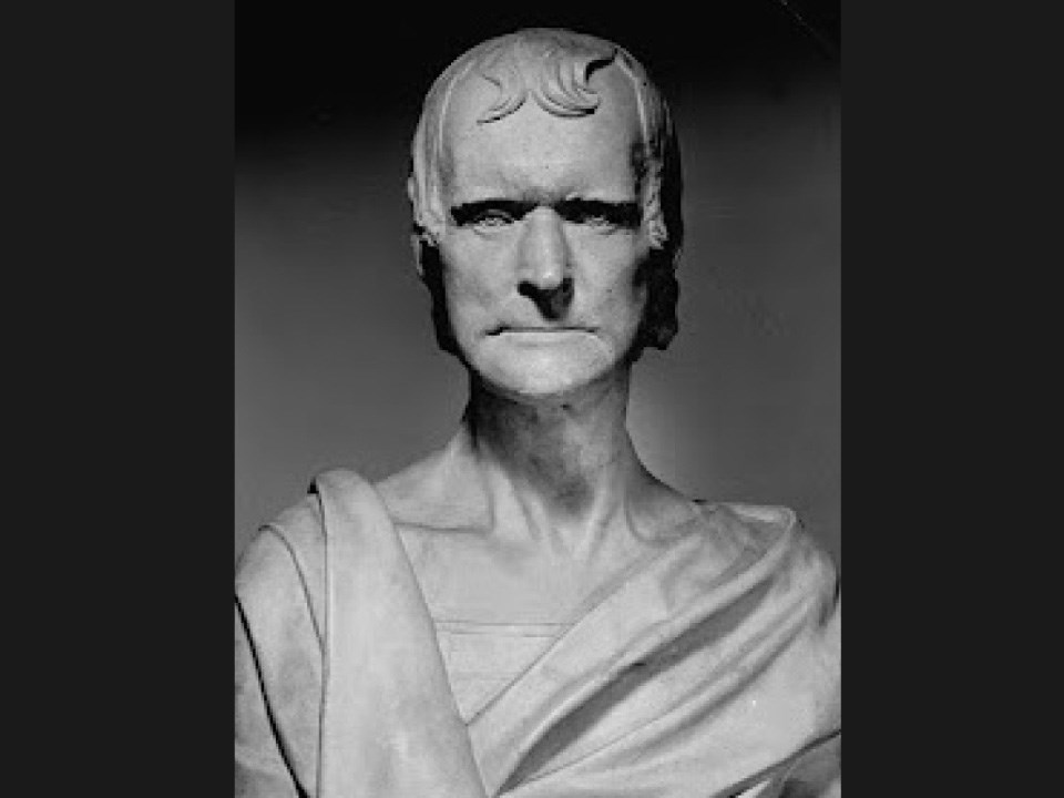 Thomas-Jefferson-life-mask A black and white photograph of Jefferson’s life-mask bust by Browere. The aged face of the former president is looking directly at the viewer. The face is solemn and a loosely draped garment is wrapped around his shoulders.