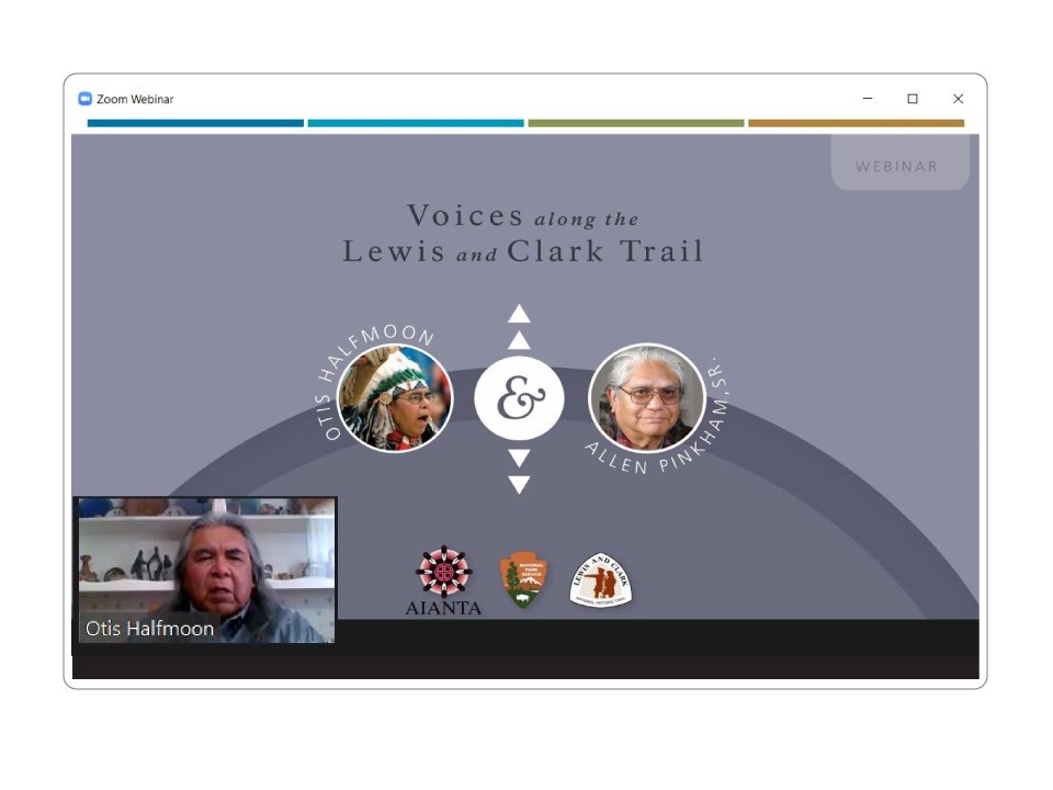 Webinar screenshot. Title slide Voices along the Lewis and Clark Trail. Otis Halfmoon. Allen Pinkham Sr. Otis Halfmoon on screen. Grey shoulder length hair.