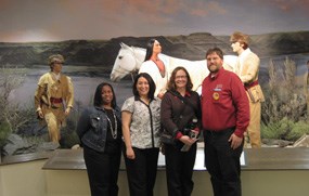 Nichole McHenry, Karla Sigala, and Jill Hamilton-Anderson visiting with museum director James Payne of the Fort Walla Walla Museum in Washington state. Nichole McHenry, Karla Sigala, and Jill Hamilton-Anderson visiting with museum director James Payne of the Fort Walla Walla Museum in Washington state.