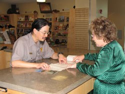 Ranger and visitor at Trail headquarters. Ranger and visitor at Trail headquarters.
