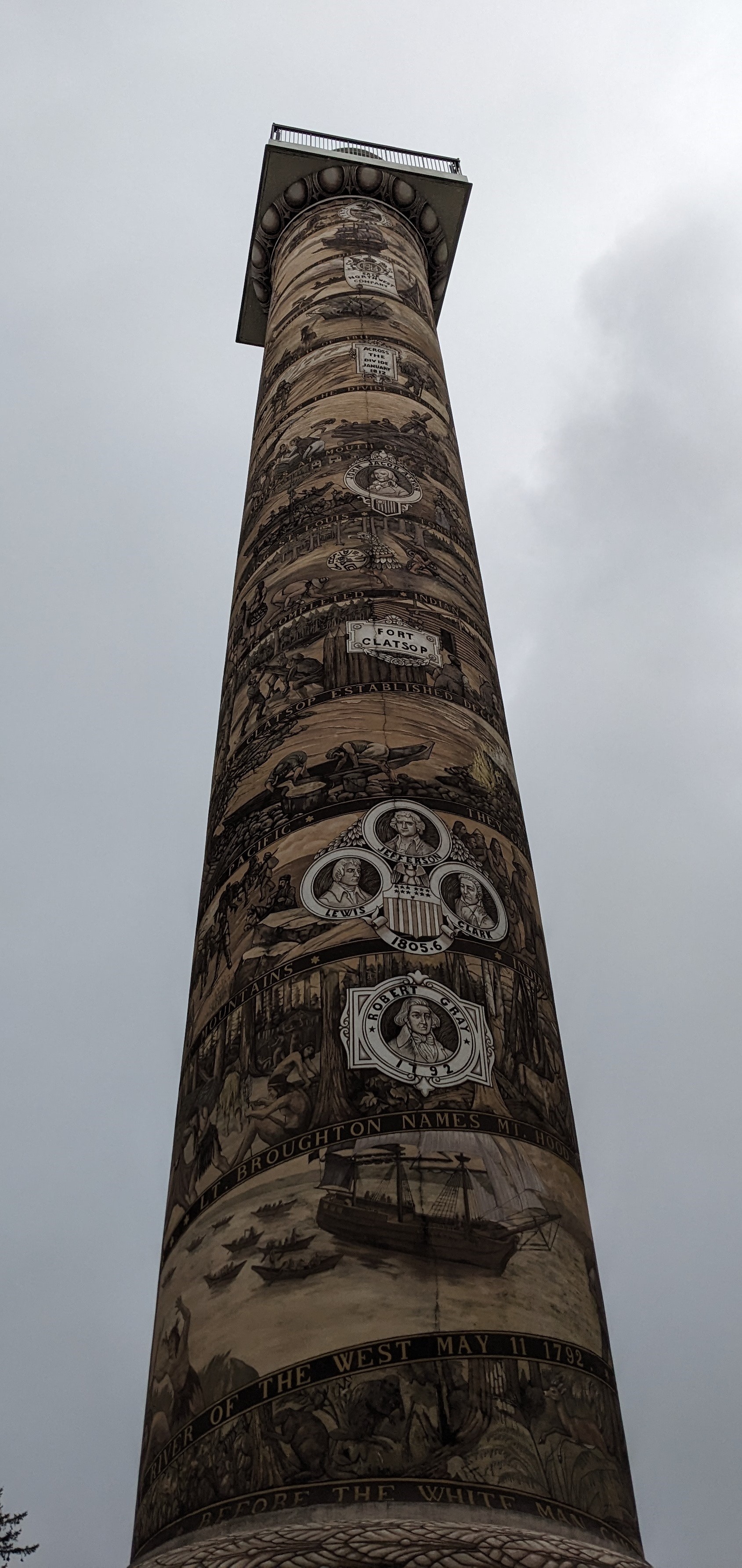 Astoria Column Looking up from the very bottom of the column to the very top. The column depicts the history of Astoria from pre-1800's to modern era.