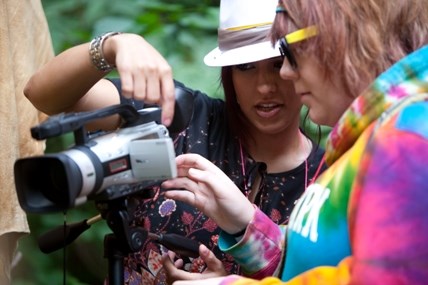 Film Camp student with Instructor learning how to use the camera. Film Camp student with Instructor learning how to use the camera.