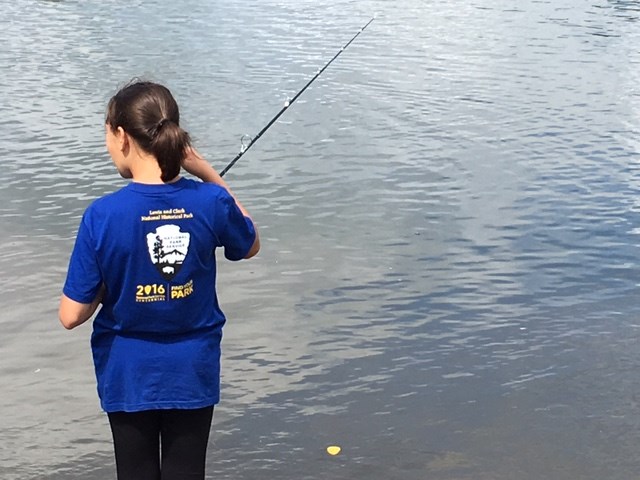 A young girl fishing