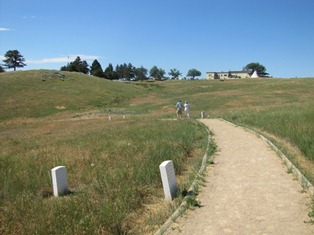 Deep Ravine trail with headstones on the left side of the trail leading back to the Visitor Center. Deep Ravine trail with headstones on the left side of the trail leading back to the Visitor Center.