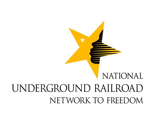 Logo made of a yellow star with the silhouette of a person's face inside, looking up at a smaller white star within the yellow star