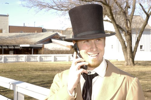 Lincoln Home NHS Living History Ranger with cell phone Lincoln Home NHS Living History Ranger with cell phone
