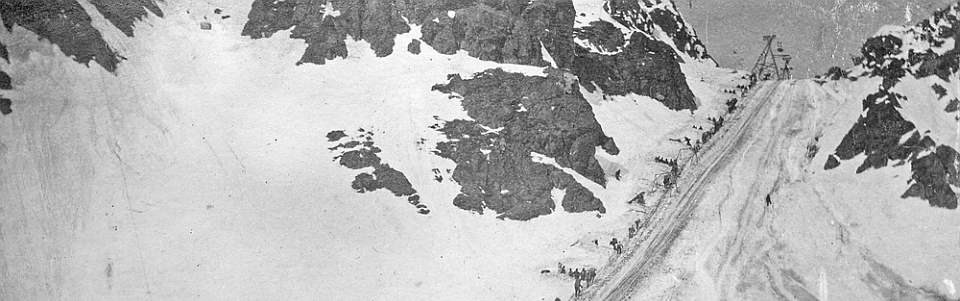 A line of people work on the chilkoot trail during the klondike gold rush