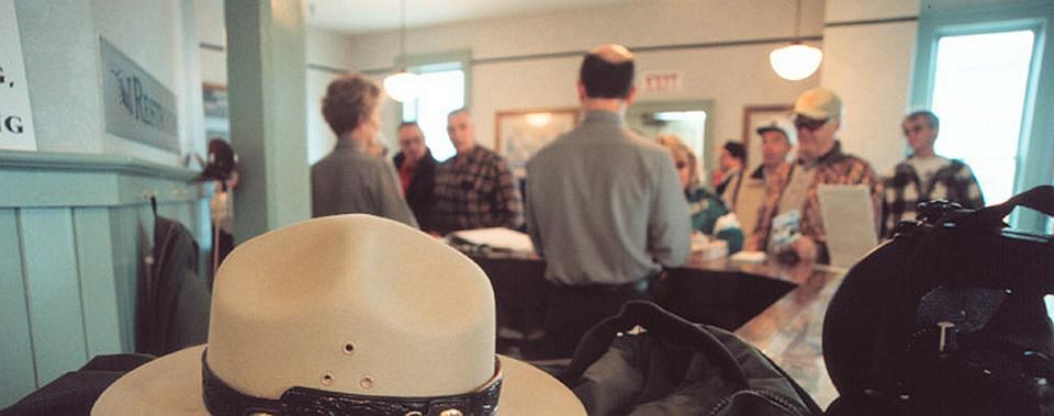 National Park Service Rangers listening to their visitors