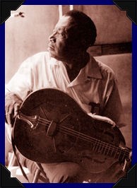 Bukka White with guitar