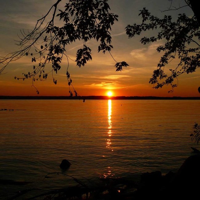 Brilliant orange sunset on the Mississippi River