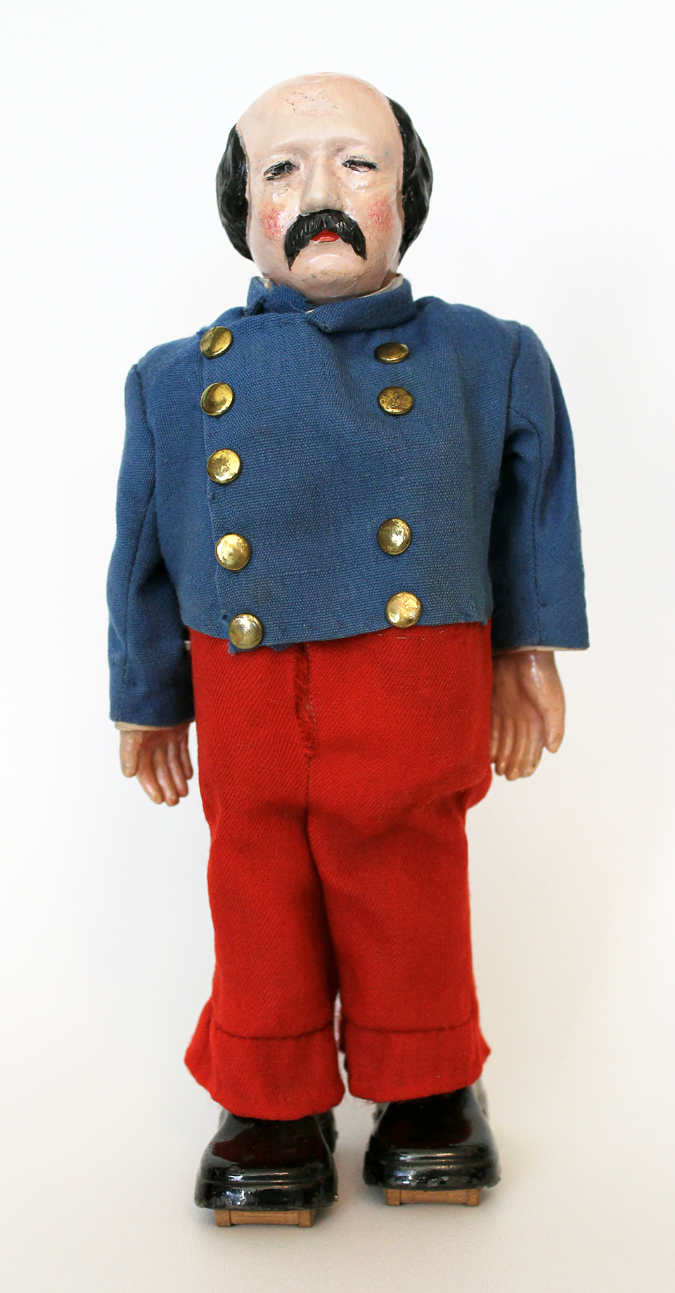 A 19th century mechanical walking doll toy made in the likeness of U.S. politician and general Benjamin Butler.