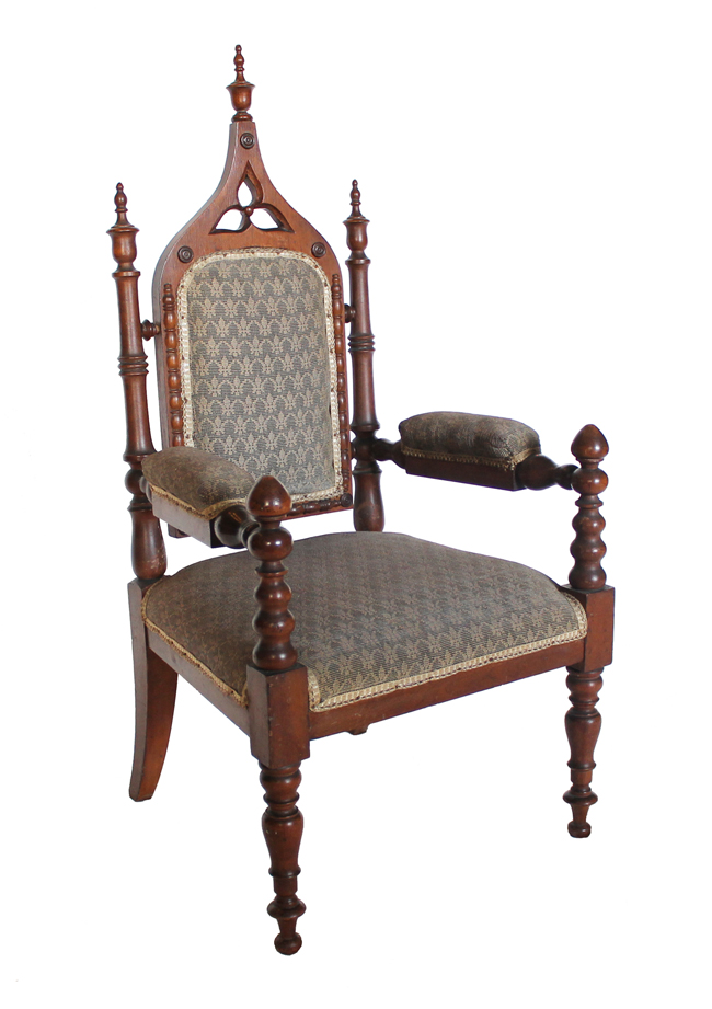 A child sized Gothic Revival chair from the Longfellow House. A child sized Gothic Revival chair from the Longfellow House.