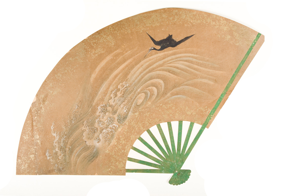 Japanese fan painting showing a black crane flying over waves. Japanese fan painting showing a black crane flying over waves.