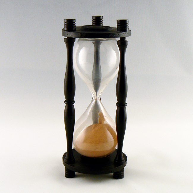 An hourglass containing sand from the Sahara Desert.