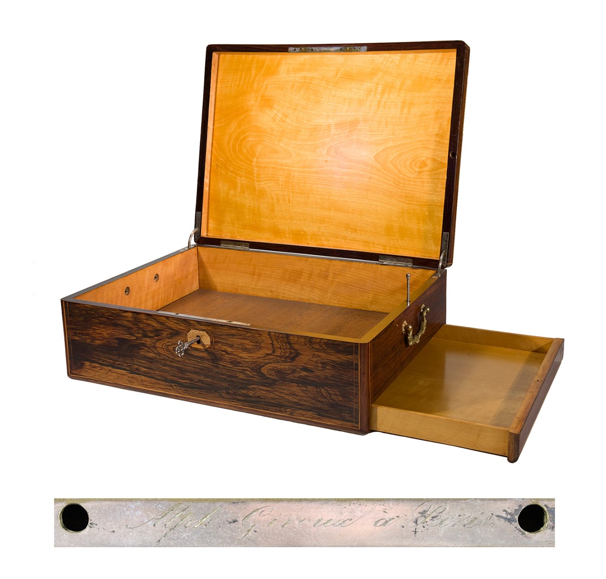 A rosewood box with a hidden compartment from 19th century Parisian retailer Alphonse Giroux.