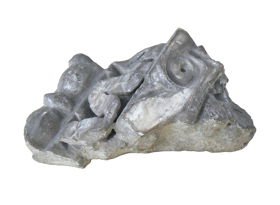A fragment of marble, possibly from Cicero's villa in Tusculum, near Rome. A carved marble architectural fragment.