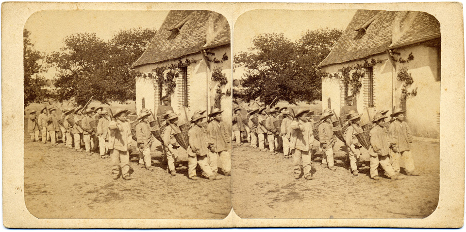A stereograph card showing boys at the Mettray Penal Colony in France, circa 1880.