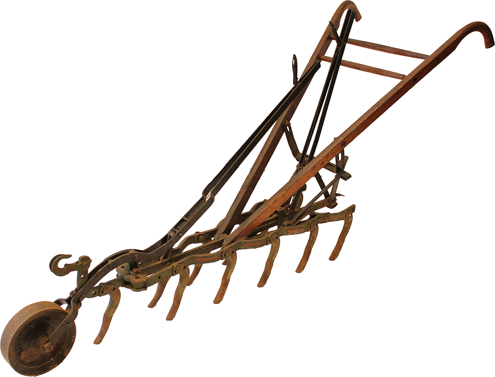 A Planet Jr. harrow and cultivator from the late 19th/early 20th century. A Planet Jr. harrow and cultivator from the late 19th/early 20th century.